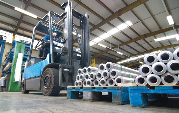 A forklift moving lead sheet at Uzimet